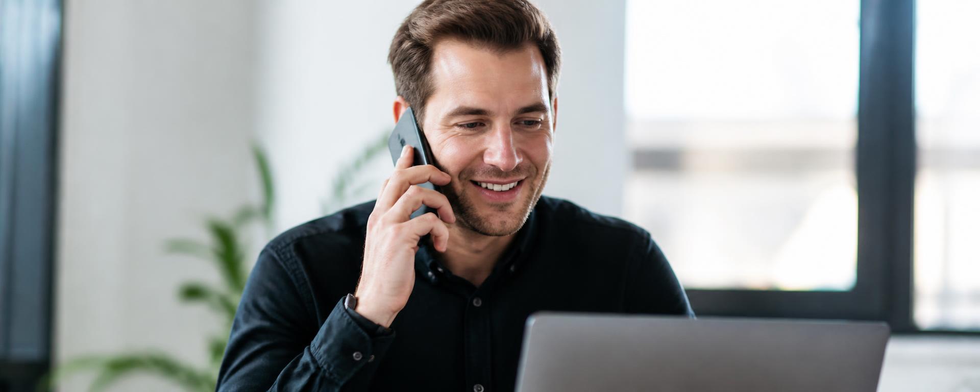 Network Digital designer taking a client call in the Knaresborough studio