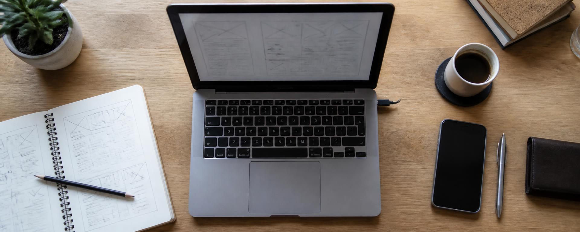 Web design and SEO planning desk with wireframes and keyword notes